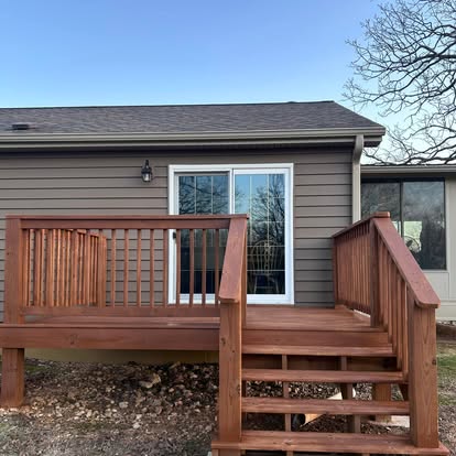 Cedar deck freshly stained in a warm cedar tone