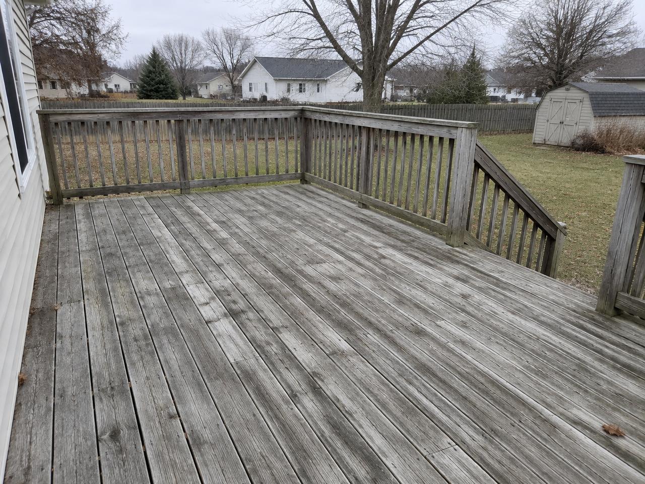 Deck before: gray, weathered boards